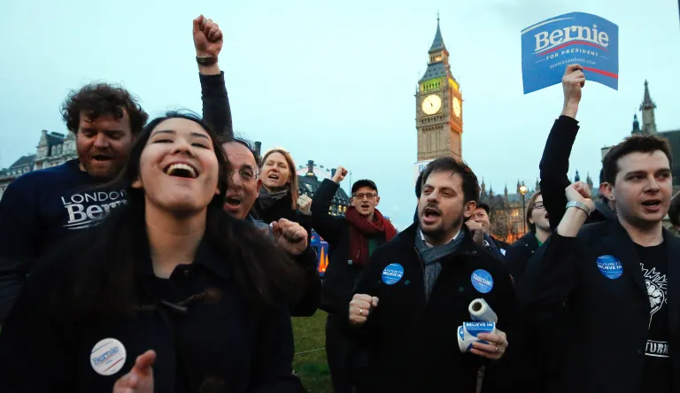 Supporters of democratic candidate Bernie Sanders gather in London, Tuesday, March 1, 2016 as voting begins in the U.S. Democrats Abroad Global Presidential Primary.