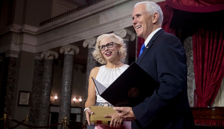 Vice President Mike Pence administers the Senate oath of office to Sen. Kyrsten Sinema, D-Ariz., during a mock swearing in ceremony in the Old Senate Chamber on Capitol Hill in Washington, Thursday, Jan. 3, 2019, as the 116th Congress begins.
