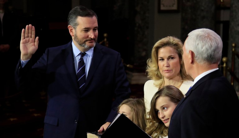 Vice President Mike Pence administers a ceremonial Senate oath during a mock swearing-in ceremony to Sen. Ted Cruz, R-Texas, accompanied by his family Thursday, Jan. 3, 2019, in the Old Senate Chamber on Capitol Hill in Washington.
