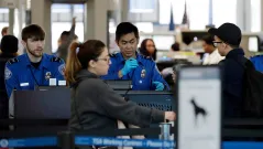 Shutdown forces TSA to shift security screeners to major airports