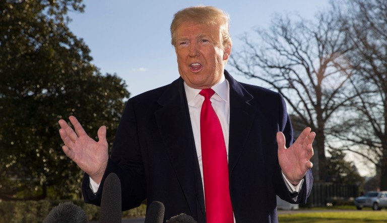 President Trump speaks on the South Lawn of the White House as he walks to Marine One, Sunday, Jan. 6, 2019, in Washington.