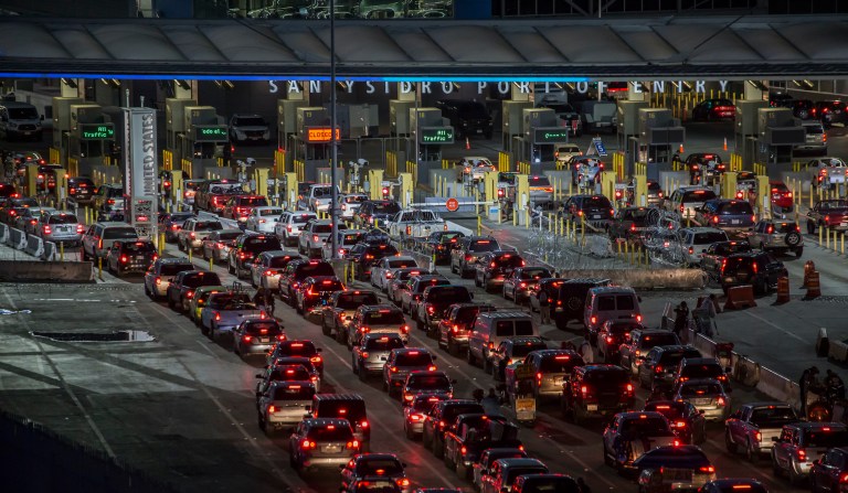 US and Mexico agree to block all nonessential travel at shared border, exempting trade