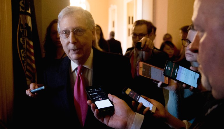 Senate Majority Leader Mitch McConnell of Ky. speaks to reporters as he walks into his office for a meeting with Senate Republicans on Capitol Hill in Washington, D.C.