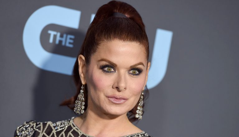 Debra Messing arrives at the 24th annual Critics' Choice Awards on Sunday, Jan. 13, 2019, at the Barker Hangar in Santa Monica, Calif. 