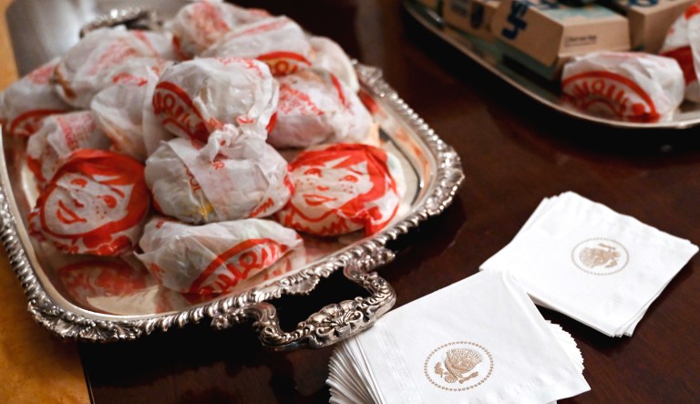A table full of fast food in the State Dining Room of the White House in Washington, D.C., is ready for guests attending a reception.