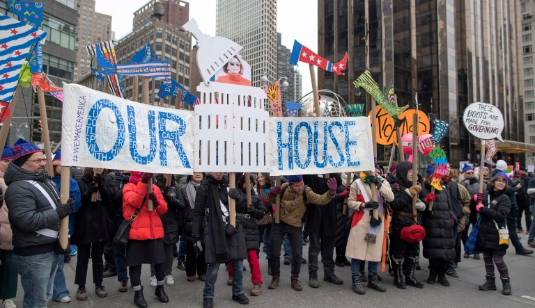 Demonstrators march past the Trump International Hotel and Tower during the Women's March Alliance, Saturday, Jan. 19, 2019, in New York.