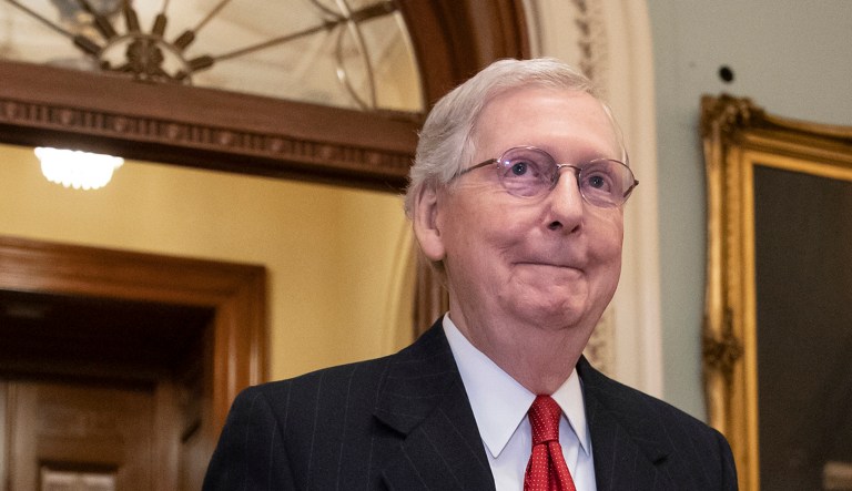 Senate Majority Leader Mitch McConnell, R-Ky., steps out of the chamber.