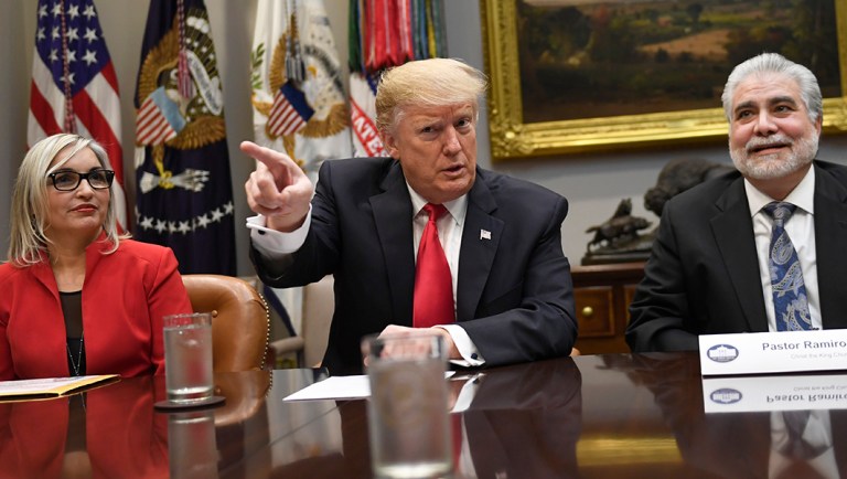 President Trump speaks during a meeting.