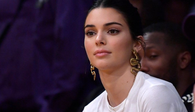 Kendall Jenner watches during the first half of an NBA basketball game between the Los Angeles Lakers and the Philadelphia 76ers Tuesday, Jan. 29, 2019, in Los Angeles.