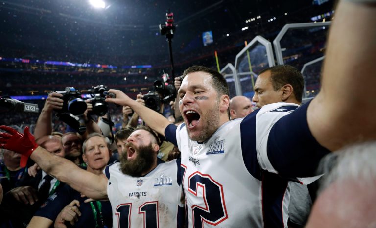 New England Patriots' Julian Edelman, left, and Tom Brady celebrate after the NFL Super Bowl 53 football game against the Los Angeles Rams, Sunday, Feb. 3, 2019, in Atlanta. 
