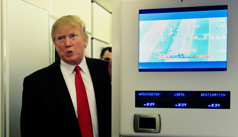 In this Sunday, Feb. 3, 2019 file photo, President Donald Trump speaks to reporters onboard Air Force One, on his way back to the White House in Washington from a weekend at his Mar-a-Lago estate in Palm Beach, Fla.