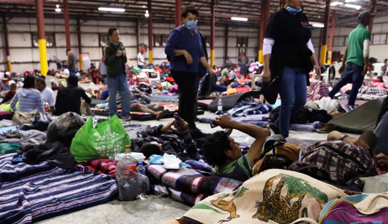 A caravan of about 1,600 Central American migrants camped Tuesday in the Mexican border city of Piedras Negras, just west of Eagle Pass, Texas. 