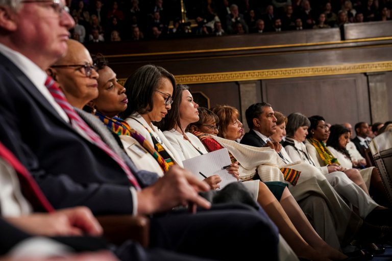 Many Democratic legislators wear white as President Trump gives his State of the Union address to a joint session of Congress, Tuesday, Feb. 5, 2019 at the Capitol in Washington. 