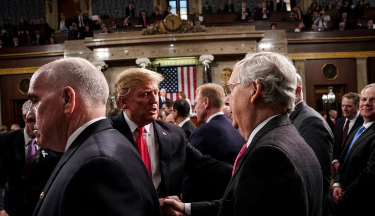 President Donald Trump talks to Senate Majority leader Mitch McConnell while leaving the House chamber after giving his State of the Union address to a joint session of Congress, Tuesday, Feb. 5, 2019 at the Capitol in Washington.