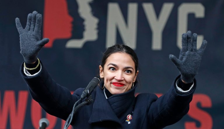 In this Jan. 19, 2019, file photo, Rep. Alexandria Ocasio-Cortez, D-N.Y., waves to the crowd after speaking at Women's Unity Rally in Lower Manhattan in New York.