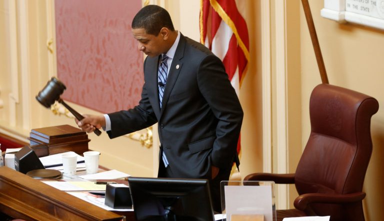 Virginia Lt. Gov. Justin Fairfax, gavels the session to order at the start of the Senate session at the Capitol in Richmond, Va., Friday, Feb. 8, 2019.