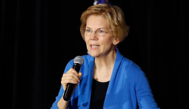 Sen. Elizabeth Warren, D-Mass., speaks to local residents during an organizing event in Cedar Rapids, Iowa.