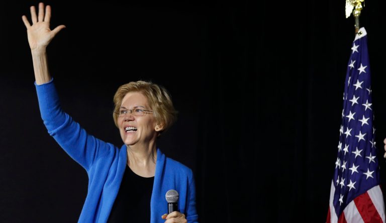 Sen. Elizabeth Warren, D-Mass., waves to local residents as she arrives at an organizing event, Sunday, Feb. 10, 2019, in Cedar Rapids, Iowa.