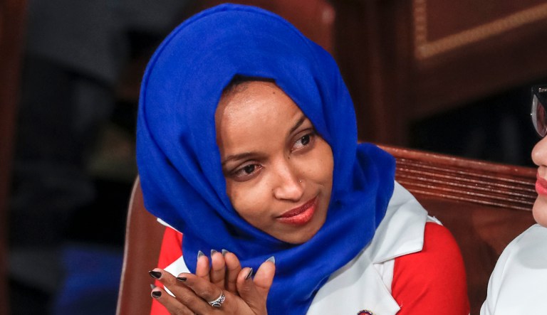 In this Feb. 5, 2019 photo, Rep. Ilhan Omar, D-Minn., listens to President Donald Trump's State of the Union speech, at the Capitol in Washington.