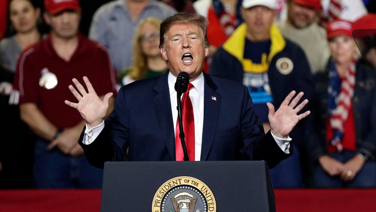 President Trump speaks during a rally at the El Paso County Coliseum.
