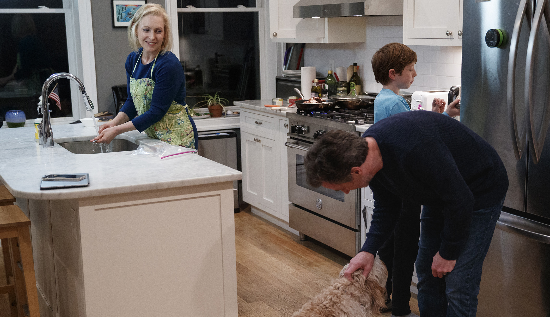Democratic women don aprons and pose in kitchen to woo 2020 voters