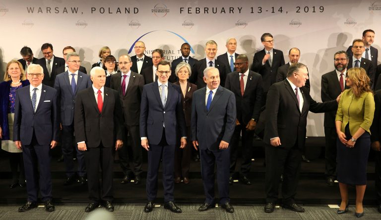 Participants pose for a group photo during a conference on Peace and Security in the Middle East in Warsaw, Poland, Thursday, Feb. 14, 2019. The Polish capital is host for a two-day international conference, co-organized by Poland and the United States. 