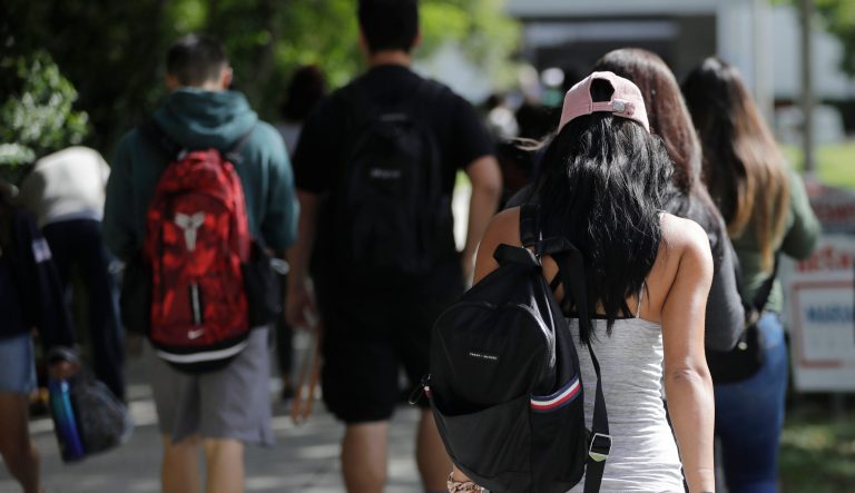In this Oct. 23, 2018 photo, students walk on the campus of Miami Dade College, in Miami. The nine companies and organizations tasked with servicing the accounts of the nationâs 30 million student loan borrowers repeatedly failed to do their jobs properly over a period of years and their regulator neglected to hold them responsible, a report finds. The report released Thursday, Feb. 14, 2019, by the Department of Educationâs independent Inspector Generalâs office shows some borrowers werenât getting the guidance and protection they needed as they sought the best plan for paying off their student loans. 