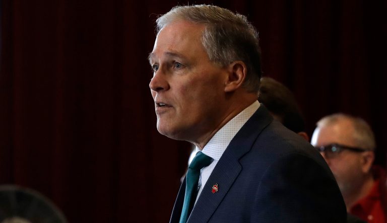 Washington Gov. Jay Inslee speaks Thursday, Feb. 14, 2019, at an event in Seattle held by the Alliance for Gun Responsibility. 