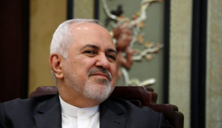 Iranian Foreign Minister Mohammad Javad Zarif talks to his Chinese counterpart Wang Yi during their meeting at the Diaoyutai State Guesthouse in Beijing, China, Tuesday, Feb. 19, 2019.