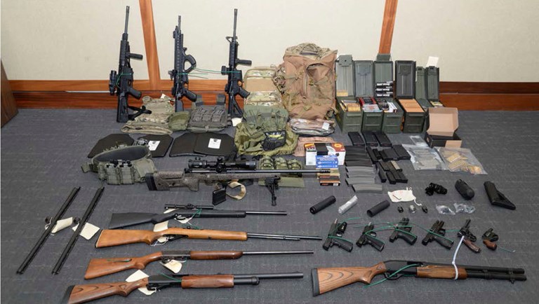 A photo of firearms and ammunition that was in the motion for detention pending trial in the case against Christopher Paul Hasson.