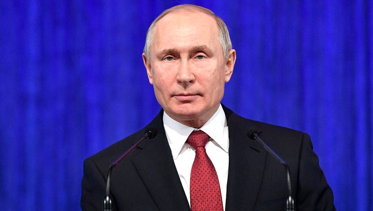 Russian President Vladimir Putin speaks during a ceremony of presenting national awards.