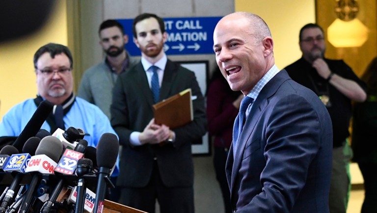 Attorney Michael Avenatti speaks to reporters.