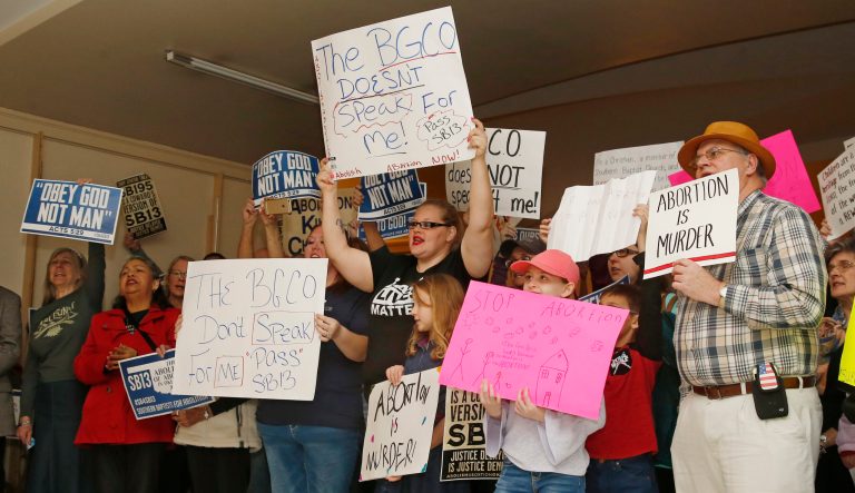 Abortion opponents cheer for a speaker at a rally Monday, Feb. 25, 2019, at the state Capitol in Oklahoma City. 