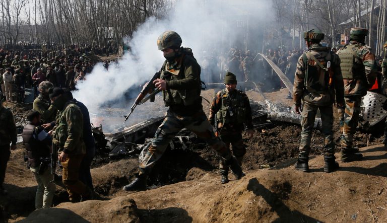 Indian army soldiers arrive at the wreckage of an an Indian helicopter after it crashed in Budgam area, outskirts of Srinagar, Indian controlled Kashmir, Wednesday, Feb.27, 2019. The crash killed six Indian air force officials and a civilian on the ground. 