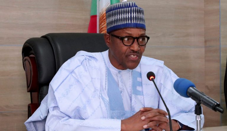 In this photo released by the Nigeria State House, Nigeria's incumbent President Muhammadu Buhari, of the All Progressives Congress party, speaks as he was declared the winner of the just concluded Presidential election in Abuja Wednesday, Feb. 27, 2019.
