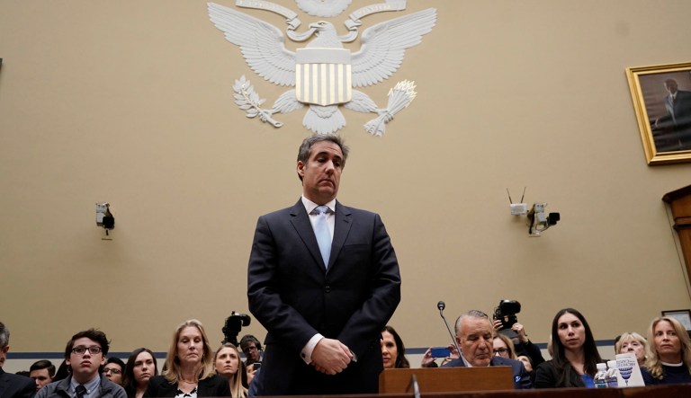 Michael Cohen, President Donald Trump's former personal lawyer, pauses just after being sworn in to testify before the House Oversight and Reform Committee on Capitol Hill in Washington, Wednesday, Feb. 27, 2019. 