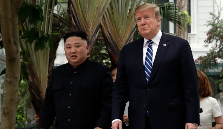President Donald Trump and North Korean leader Kim Jong Un take a walk after their first meeting at the Sofitel Legend Metropole Hanoi hotel, Thursday, Feb. 28, 2019, in Hanoi. 