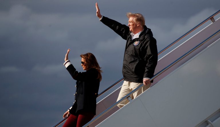 President Donald Trump and first lady Melania Trump waves as they arrive on Air Force One at Palm Beach International Airport, in West Palm Beach, Fla., Friday, March 8, 2019, en route to Mar-a-lago in Palm Beach, Fla.