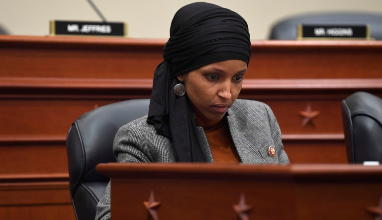 Rep. Ilhan Omar, D-Minn., listens as Office of Management and Budget Acting Director Russell Vought testifies before the House Budget Committee on Capitol Hill in Washington, Tuesday, March 12, 2019, during a hearing on the fiscal year 2020 budget.