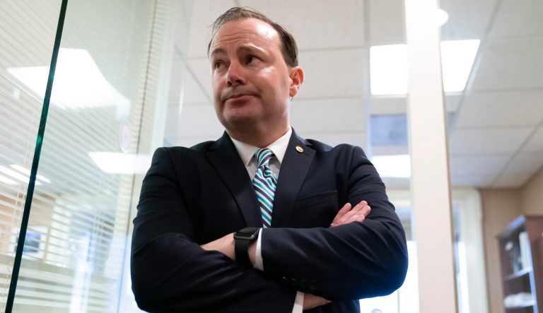 Sen. Mike Lee of Utah pauses before a news conference at the Capitol in Washington, Wednesday, March 13, 2019. 
