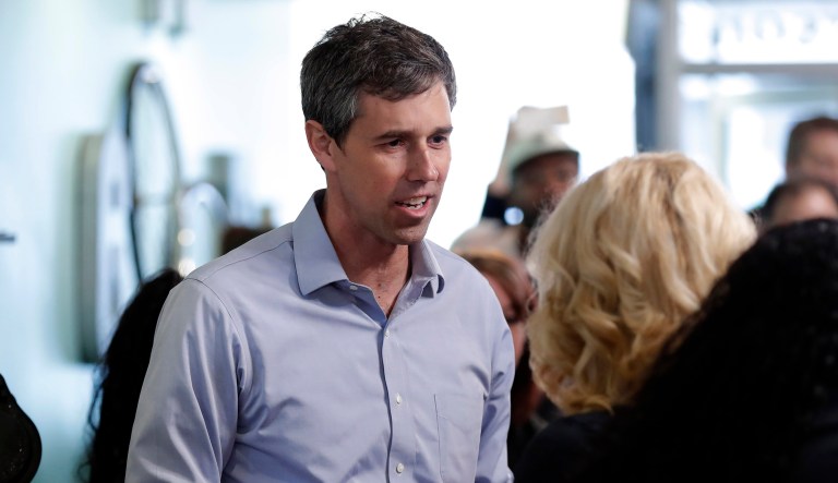 Former Texas Rep. Beto O'Rourke greets employees before speaking at a meet and greet at the Beancounter Coffeehouse & Drinkery, Thursday, March 14, 2019, in Burlington, Iowa.