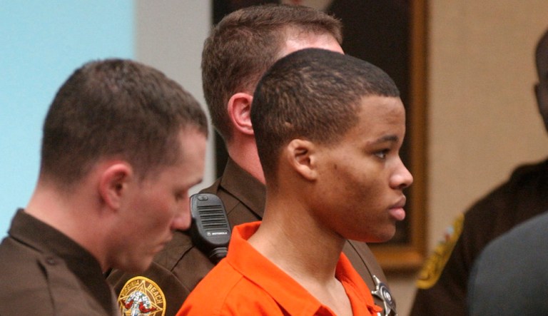 In this Oct. 20, 2003 photo, Lee Boyd Malvo listens to court proceedings during the trial of fellow sniper suspect John Allen Muhammad in Virginia Beach, Va. 