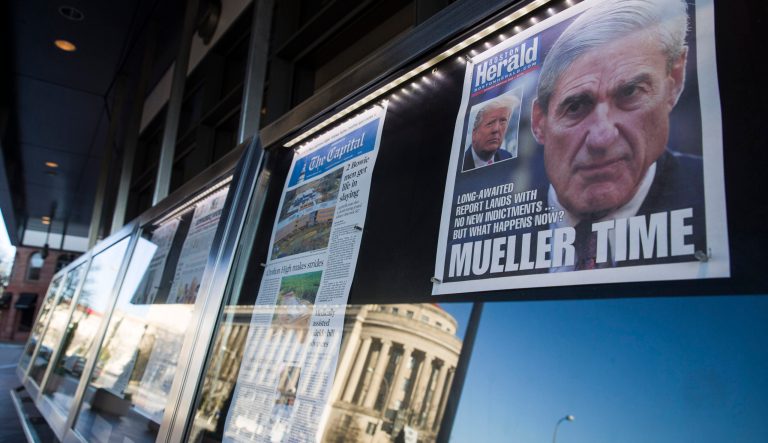 Newspaper front pages from around the nation are on display at the Newseum Saturday, March 23, 2019, in Washington. 
