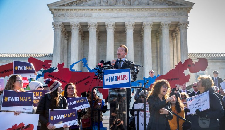 Former California Gov. Arnold Schwarzenegger speaks at a rally calling for "Fair Maps" at the Supreme Court in Washington, as justices hear arguments about partisan gerrymandering, the practice of political parties crafting congressional districts that unfairly benefit one party over another, in Washington, Tuesday, March 26, 2019. 