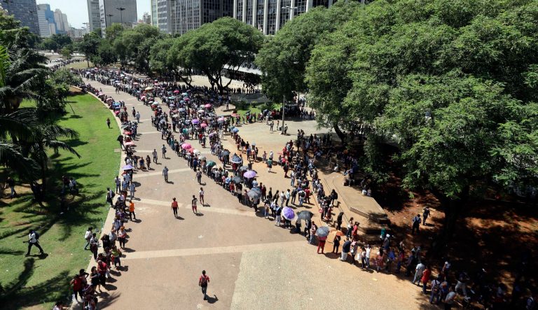 Unemployed line up  to attend a job fair organized by the local government and a trade union, in downtown Sao Paulo, Brazil, Tuesday, March 26, 2019. The Getulio Vargas Foundation think tank published a study on Monday saying the average growth of the Brazilian economy between 2011 and 2020 could to be the worst since it started measuring in 1901, at 0.9 percent a year. 