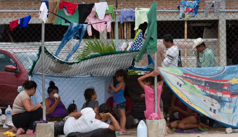 Central American migrants, part of the caravan hoping to reach the U.S. border, take a break in Acacoyagua, Chiapas State, Mexico, Thursday, March 28, 2019. 