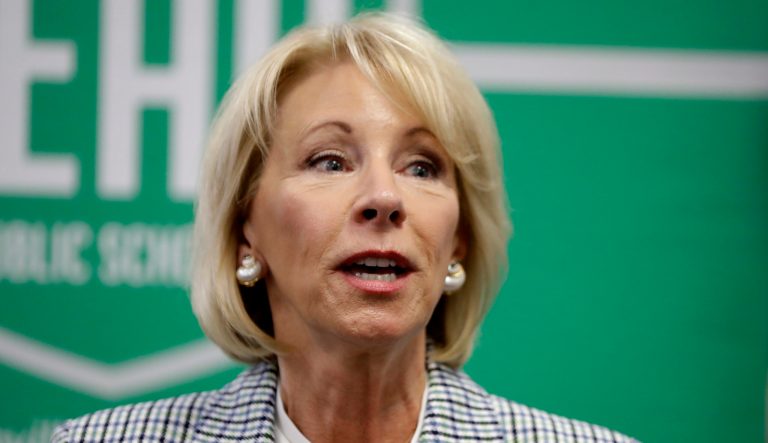 U.S. Education Secretary Betsy DeVos talks with reporters during a visit to Cameron Middle School Monday, April 1, 2019, in Nashville, Tenn. 