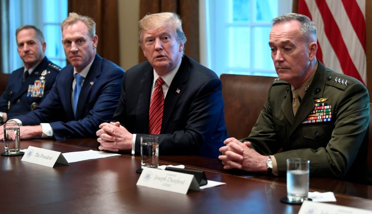 President Donald Trump, second from right, flanked by acting Defense Secretary Patrick Shanahan, second from left, and Chairman of the Joint Chiefs of Staff Gen. Joseph Dunford, right, speaks during a meeting with military leaders in the Cabinet Room of the White House in Washington, Wednesday, April 3, 2019. At left is Air Force Chief of Staff Gen. David Goldfein. 