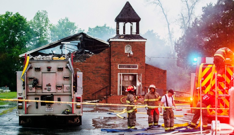 Firefighters and fire investigators respond to a fire at Mt. Pleasant Baptist Church Thursday, April 4, 2019, in Opelousas, La. Authorities in southern Louisiana are investigating a string of "suspicious" fires at three African American churches in recent days. Fire Marshal H. "Butch" Browning said it wasn't clear whether the fires in St. Landry Parish are connected and he declined to get into specifics of what the investigation had yielded so far but described the blazes as "suspicious." 