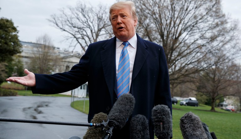 President Donald Trump speaks with reporters before boarding Marine One on the South Lawn of the White House, Friday, April 5, 2019, in Washington.